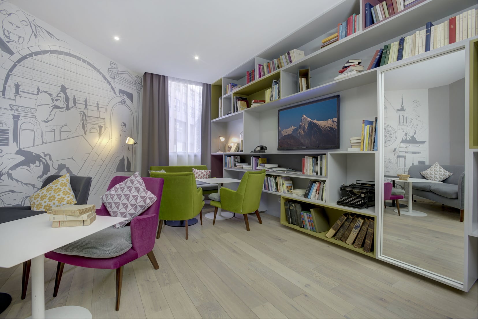 Salón con televisión en nuestro apart hotel en Lyon 3