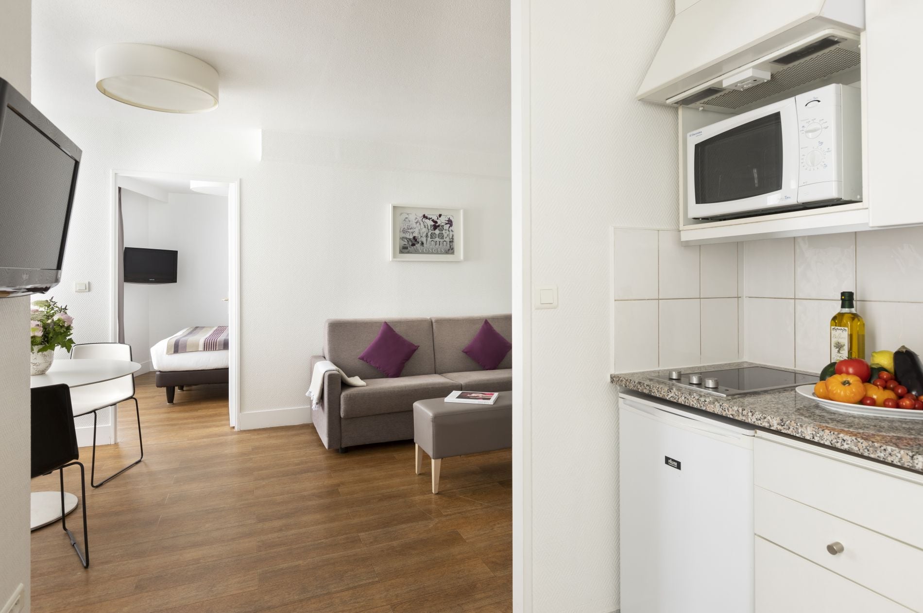Fully equipped kitchen of a 1-Bedroom Apartment, apart hotel Paris 11