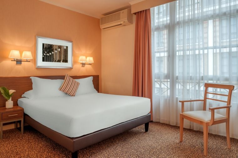 Chambre d'un Appartement 2 pièces équipée d'un lit double, appart hotel Paris 6