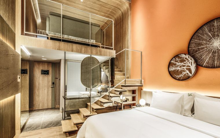 Cozy bedroom interior of the Loft Family room at the Botanica Sanctuary in Bogor