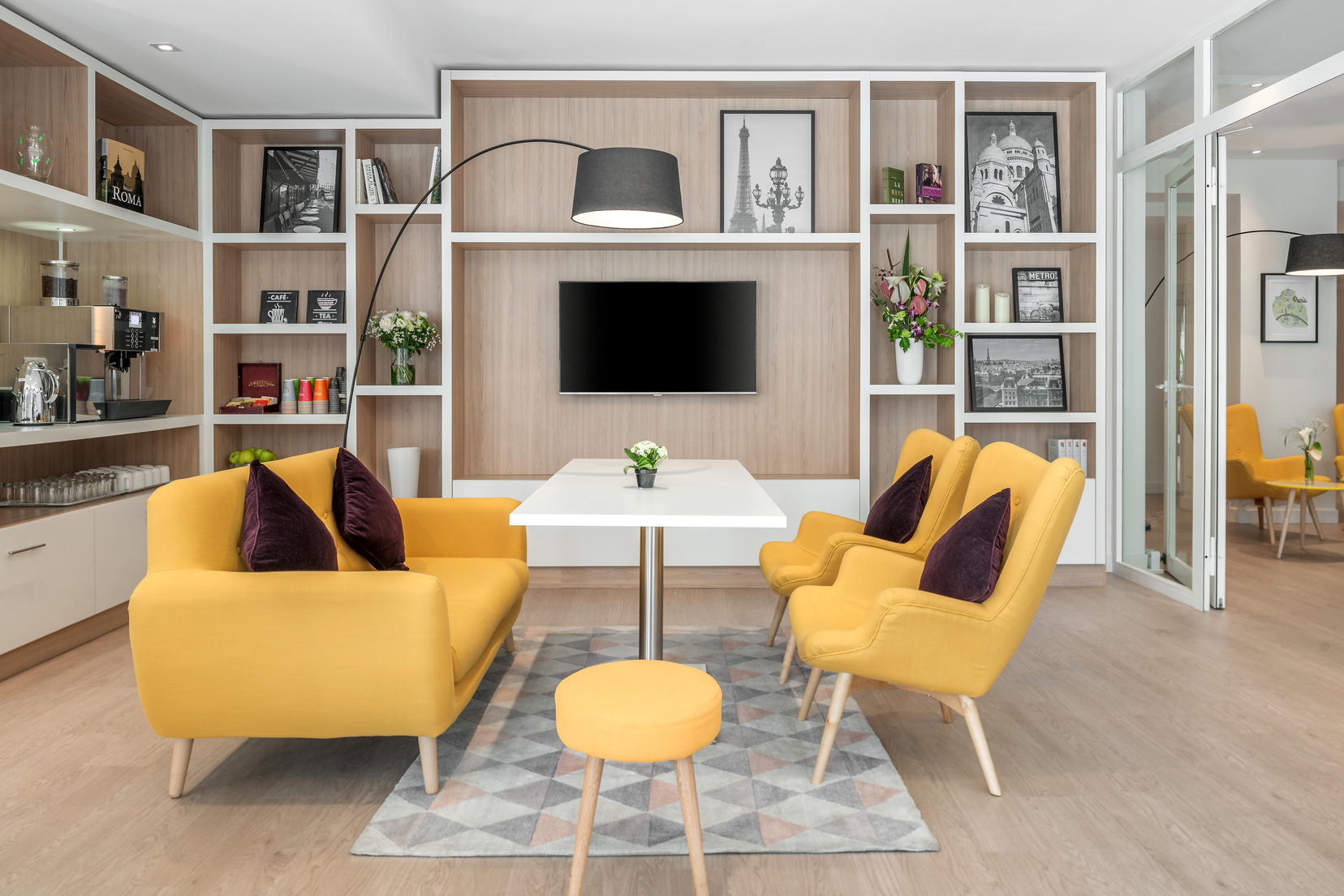Lounge area of our apart hotel in Paris 18 equipped with a free vending machine of hot drinks