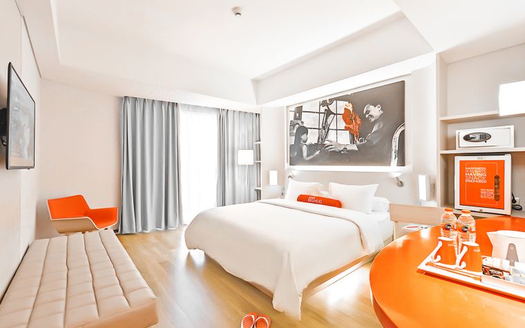 Elegant Interior of the Bedroom at HARRIS Hotel and Conventions in Solo